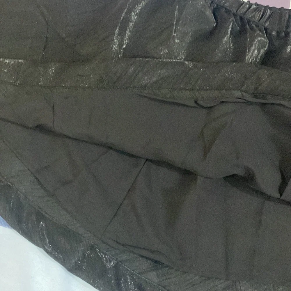 Shimmery silky flaired black mini skirt,new with tags - Picture 3 of 3